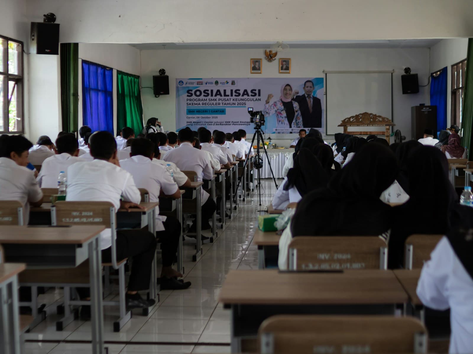 Training session in a classroom with learners viewing a presentation
